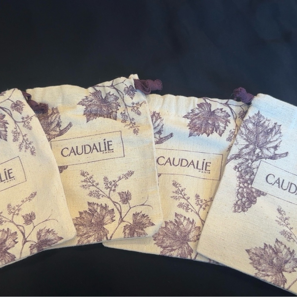Caudalie Cream and Purple Leaf Pouches